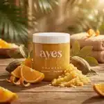 Gommage naturel à l’orange et au baobab de la marque Ayes Essentielle. Exfoliant revitalisant pour une peau douce, lumineuse et hydratée.